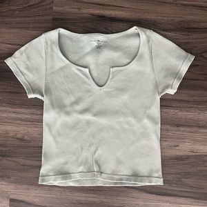 SOLD: Brandy Melville baby tee with v-neck detail